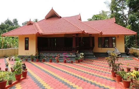 Kerala Home Designs Veedu Designs Kerala Traditional Sloped Roof Home