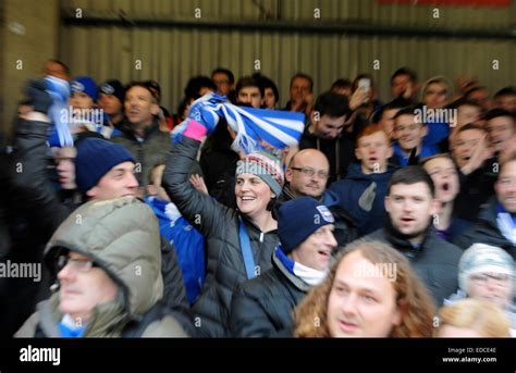 Female Football Fan Waving Her Scarf At A Brighton And Hove Albion
