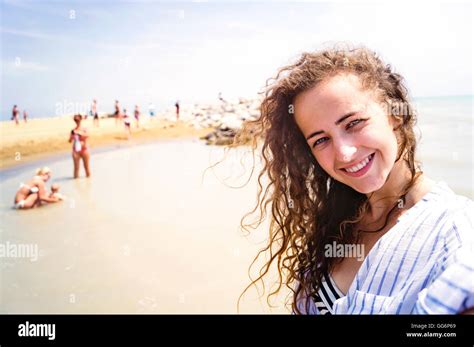 Beautiful Woman On Beach Smiling Taking Selfie Sunny Day Stock Photo