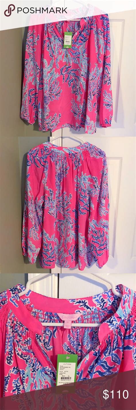Pink And Blue Blouses Are On Display At The Store
