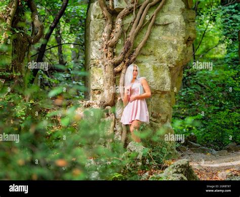 Blonde Woman In Nature Stock Photo Alamy