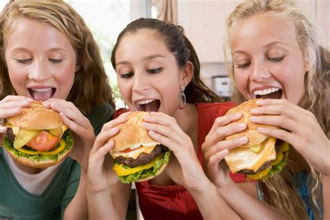 Girls Eating Burgers Thrilled H Stohos Foods