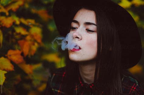 Woman Smokes By Stocksy Contributor Jovana Vukotic Stocksy