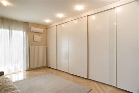 Handle with outline, sides in several finishes. Why sliding wardrobe doors are a must for your new bedroom ...