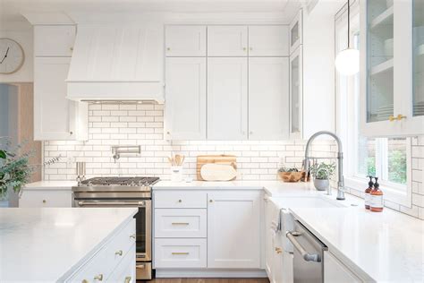 Gorgeous All White Kitchen With Mixed Metal Fixtures And Hardware