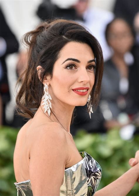 Amal Clooneys Most Iconic Hairstyles Include This Easy To Copy Ponytail