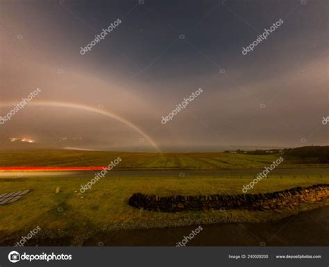 Very Rare Moonbow During The Night Above Staffin Bay Stock Photo By
