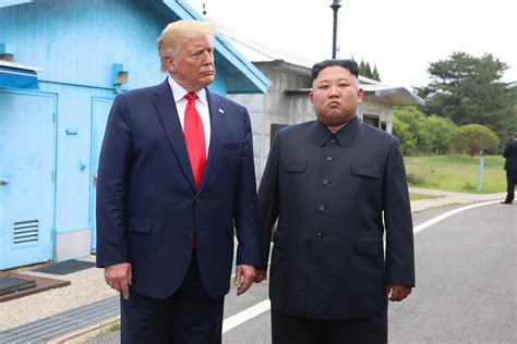 Kim jong il and kim jong un standing before a military parade. Kim Jong Un's sister says another summit with Trump is ...
