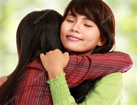 Two Women Hugging — Stock Photo © Odua 10958042