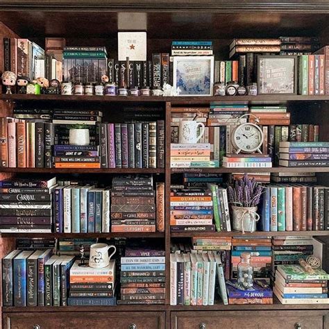 On the shelves of this dining room bookcase, matches, lighters and napkin rings are kept in vintage buckets. 17 Stylish Ways to Display Bookshelves with a Lot of Books ...