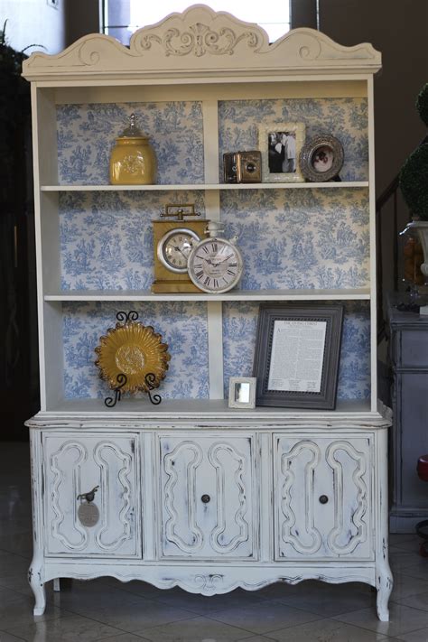 Painting the cabinets was the easiest way to have everything look cohesive. I refinished this piece before I discovered BB Frösch ...