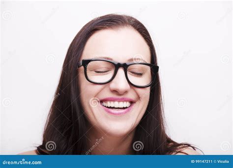 Young Brunette Woman Wearing Eyeglasses With Eyes Closed Stock Image