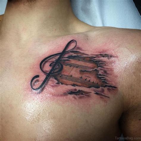 This music sign tattoo done in minimalistic style is the best choice for both men and women. 44 Magnificent Music Tattoos On Chest