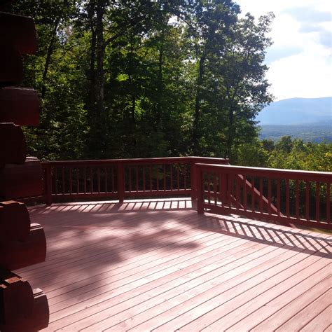Choosing a warm red paint color can be tricky. Sherwin Williams solid Deckscapes deck stain was applied to this Catskill, NY deck. | Staining ...