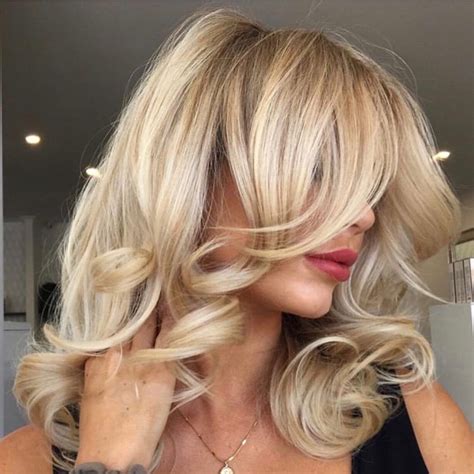 blonde and bouncy we re in love with these big blow dry curls by teri bixiecolour 😍make