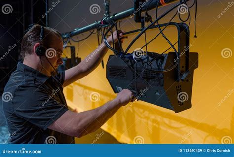 Male Theater Technician Adjusting Gear Stock Image Image Of