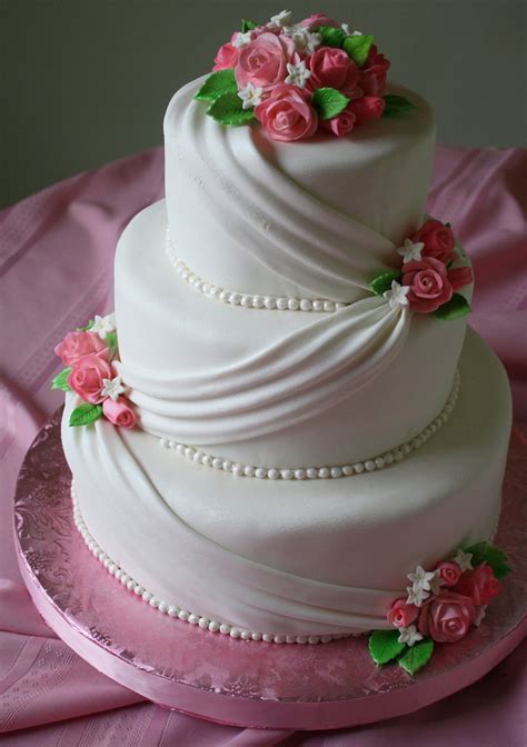 If you don't have this complete yet, please refer to my cake decorating 101 collection for all the previous steps. Fondant Wedding Cake With Pink Roses - CakeCentral.com