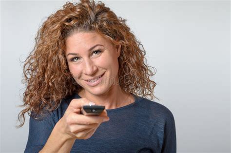 Woman Holding A Remote Control Stock Image Image Of Holding People