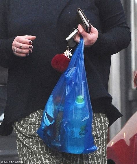 Lisa Armstrong Goes Make Up Free Before Donning A Red Lip To Leave