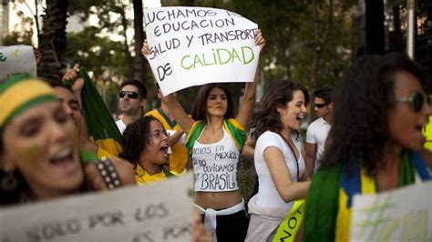 brazilian protests continue as tens of thousands flood nation s streets