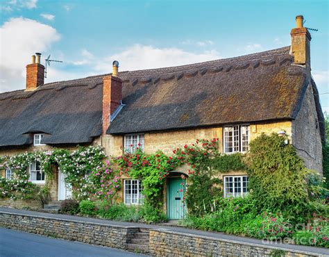 English Thatched Cottages In The Cotswolds Photograph By Tim Gainey