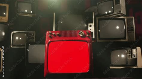 Old Tv Set With Red Screen And Many Retro Tvs Appearing From Background