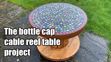 I using them on and old table to transform it into a wonderful beer cap table top with bar top finish! Building a beer bottle cap cable reel table using bottle ...