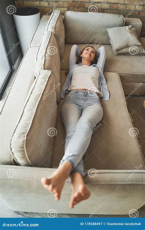 Merry Pretty Lady Relaxing On A Couch Stock Image Image Of Barefoot Foot 178588497