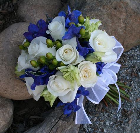 Below you can see how i have used the blue hydrangea in a low wedding centerpiece. Dark Blue Delphinium Wedding Flowers
