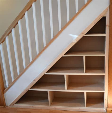 Hang your bikes under the stairs and free up floor and wall space in your home! under-stairs bookcase - Google Search (With images) | Real estates design, Bespoke furniture ...