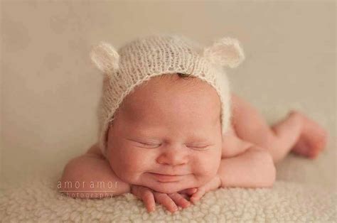 This guide will help you properly hold and position a here is what is new in my store! Newborn photos of baby with Down syndrome go viral for the ...