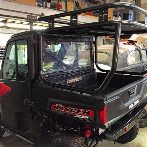 Roll Cage Roof And Safari Rack Installed On A Polaris Ranger 900xp