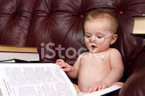 Cute Baby Reading A Book Stock Photo Royalty Free Freeimages