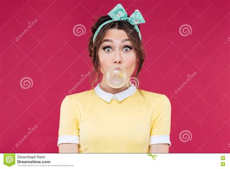 Amazed Cute Pinup Girl Blowing A Bubble Gum Balloon Stock Image Image Of Closeup Blowing