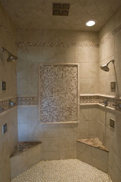 Beautiful marble shower design walk in shower tile ideas. Walk-in tile shower with tile accents, a pebble floor, two ...