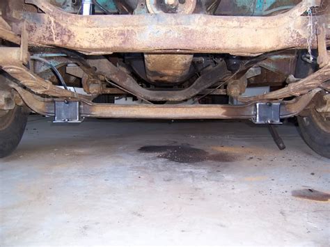 The Rear End Of A Vehicle That Is Rusted And Needs To Be Repaired Or