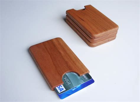 For a modern or wine theme, the stunning wooden barrel card holder adds a show stopping addition. Handmade Wooden Business Card Holder | Gadgetsin
