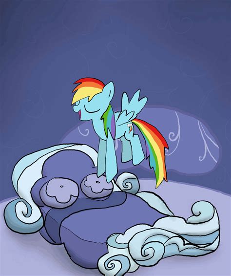 An Animated Image Of A Rainbow Dash Sitting On Top Of A Bed