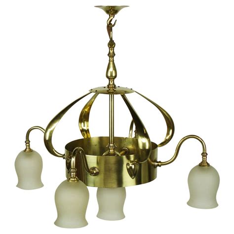 For a home that is craftsman or mission style, chandeliers look best when they reflect the style of the era of the space they illuminate. Brass Arts and Crafts Chandelier Attributed to Jesson ...