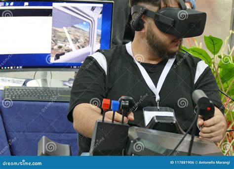 Teen Wearing Virtual Reality Device Testing Flight Simulator Editorial
