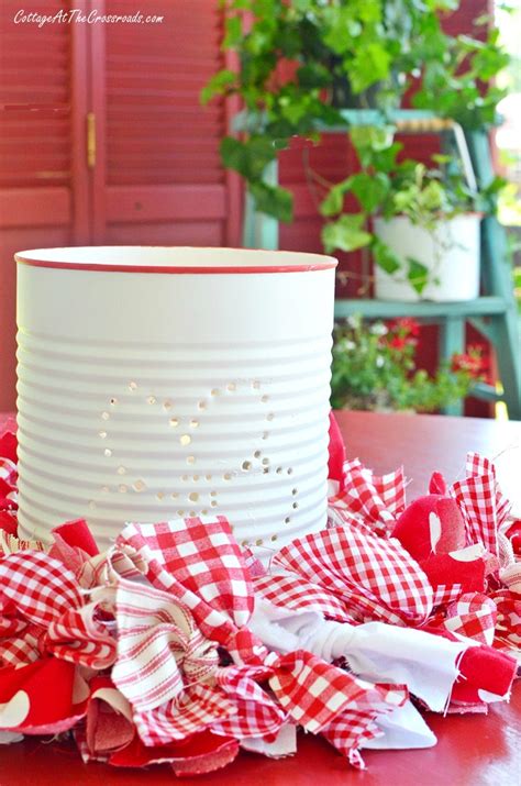DIY Punched Tin Can Lanterns | Tin can lanterns, Can ...