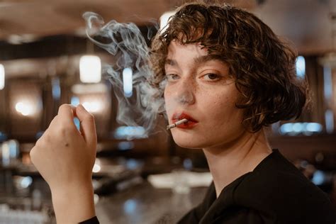Beautiful Woman Smoking Cigarette · Free Stock Photo