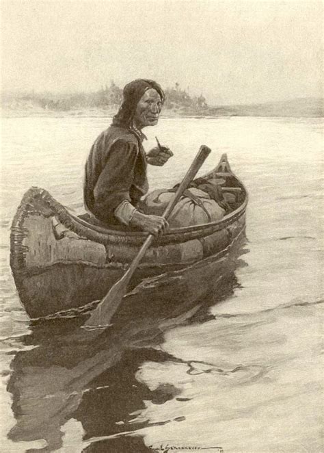 An Old Photo Of A Man In A Canoe