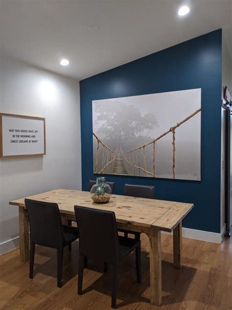 When perusing dining room ideas, consider what kind of lighting, furniture and decorative accents will transform the space into an entertaining mecca. Dining room accent wall. #accentwall #galapagosturquoise # ...