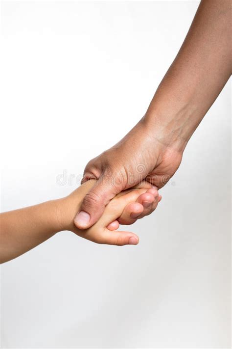 Womanand X27s Hand Holding A Childand X27s Hand Stock Photo Image Of