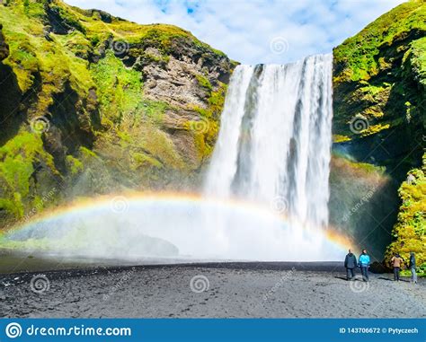 Skogafoss One Of The Most Beautiful Waterfalls On Sunny Day With