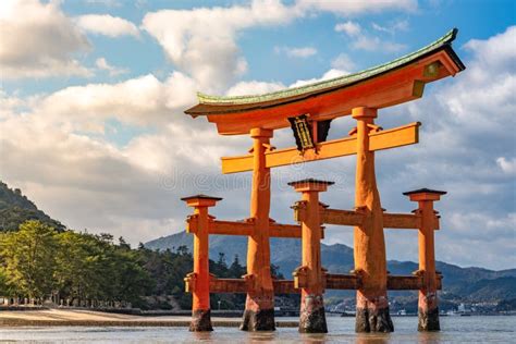 Floating Red Giant Grand O Torii Gate Stands In Miyajima Island Bay