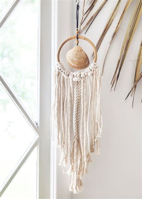 This cute macrame rainbow / semicircle wall hanging is super easy to make and only uses the square knot. Beach Shack Wall Hanging | Shell crafts diy, Seashell ...