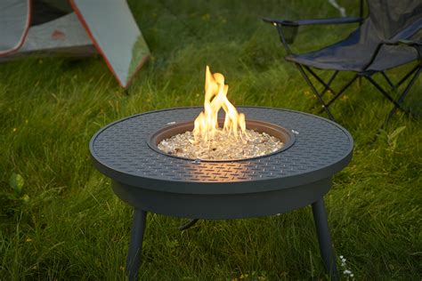 If you're a van dweller, car camper, or travel in a small rv, this will not take up much space while. New Portable Gas Fire Pit from The Outdoor GreatRoom Company