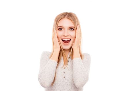 Wow Portrait Of Surprised Beautiful Young Blonde Touching Face Stock